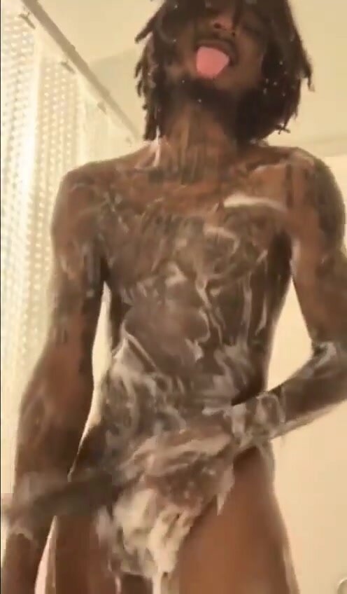 young dreadhead goon in the shower flashig dick and ass