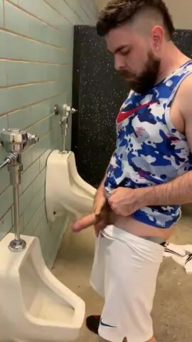 Hot hairy latino jackoff in public urinal and cum