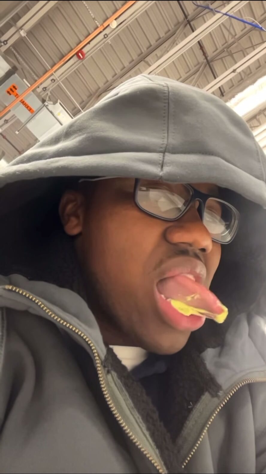 Black guy tongue out with gum