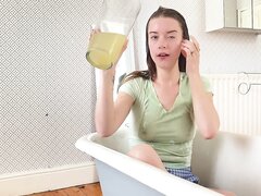 Pouring pee on herself..