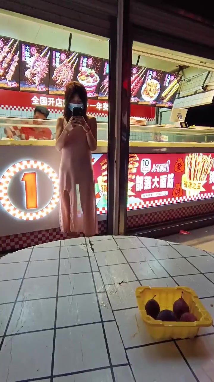 Chinese girl exposes her body in public
