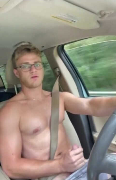 nerdy stud jerking off while driving