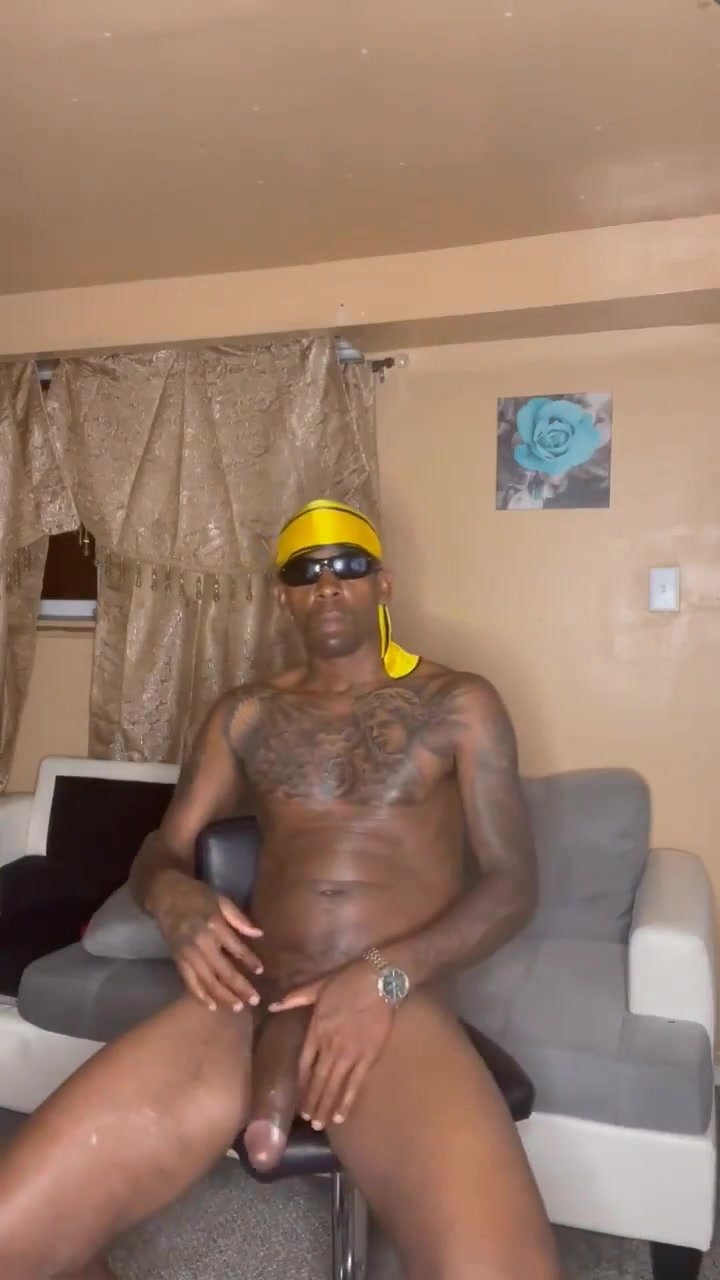 skinny black stud naked showing his big black dick