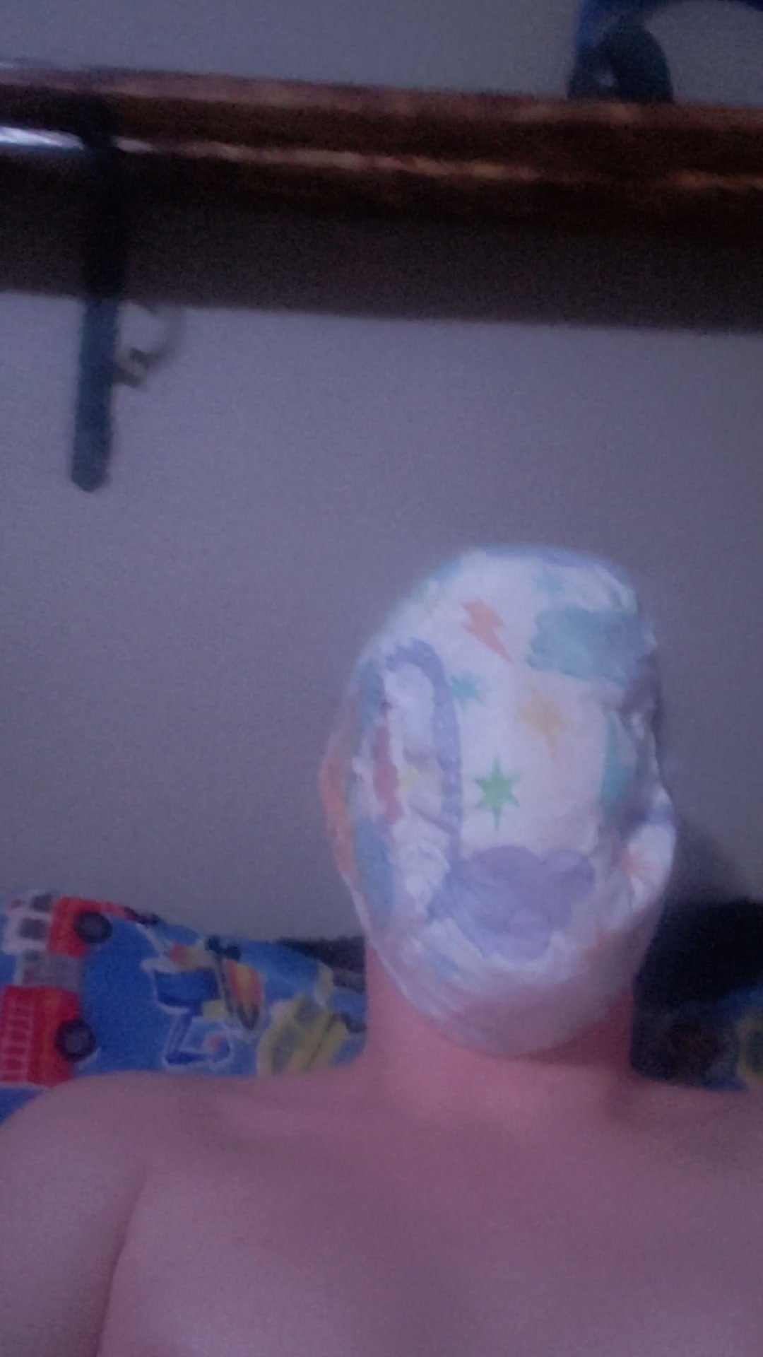 Used diaper on face