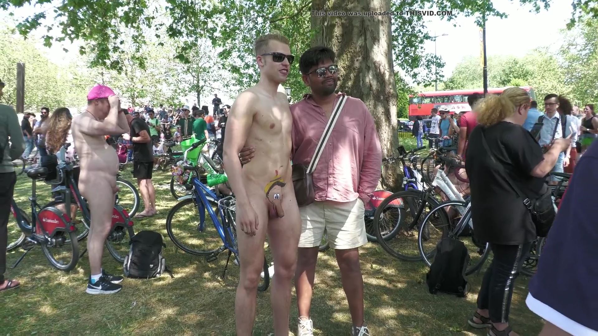 nude cyclist poses for photos
