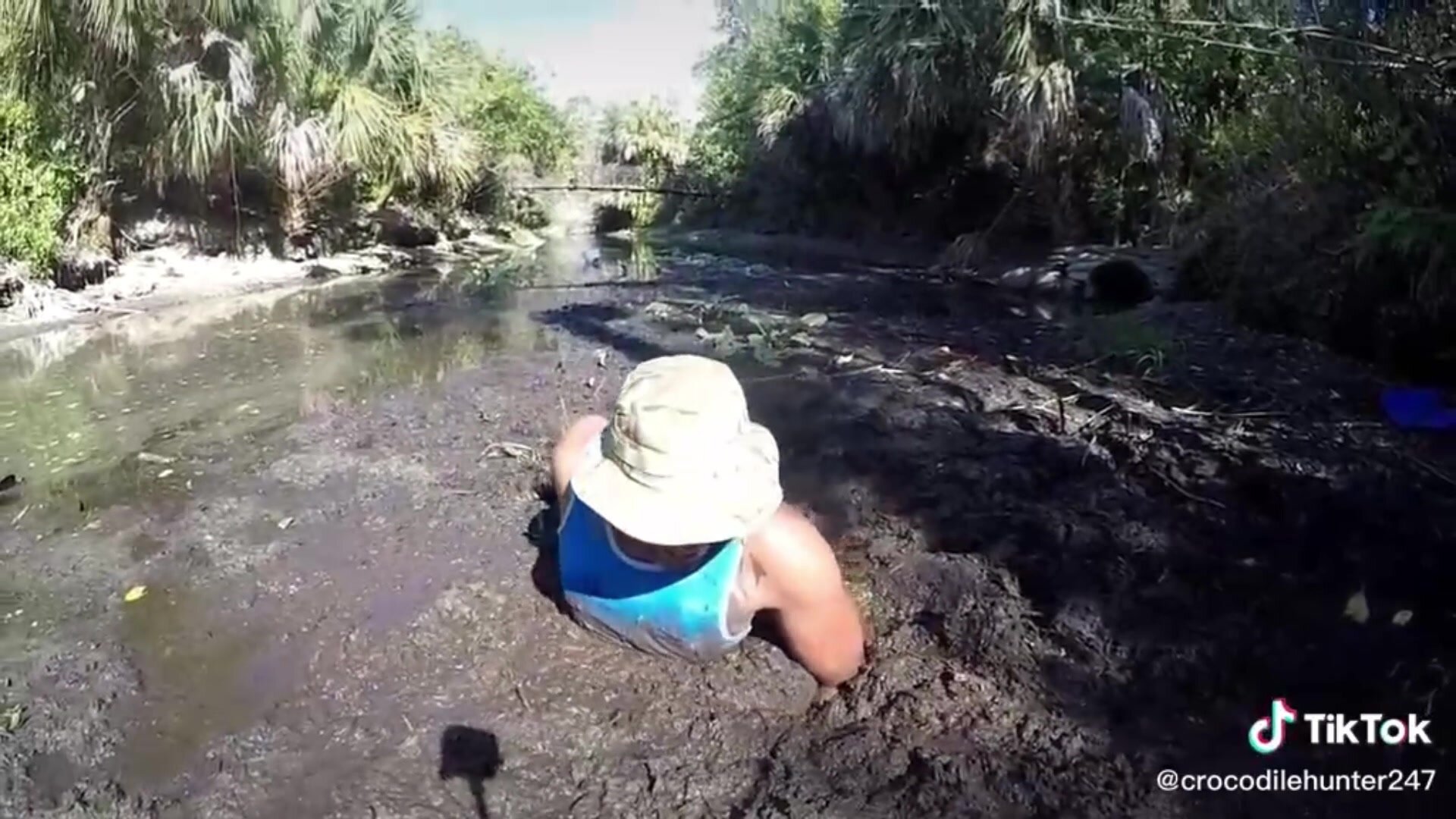 Tiktok hunter stuggles against sticky river mud