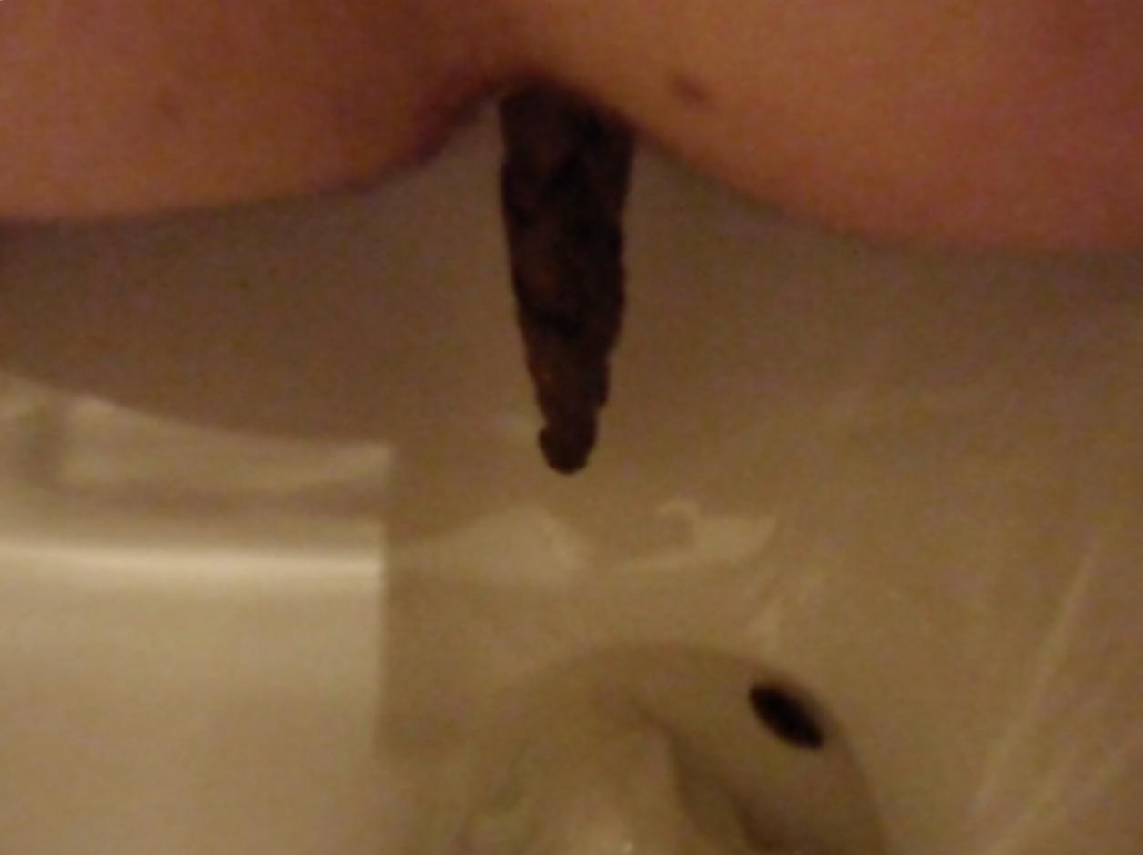 My sister shitting in our toilet