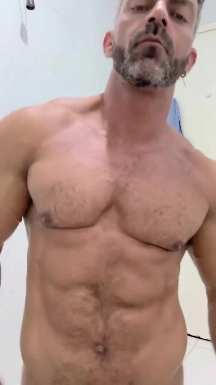 Hairy daddy showing his body