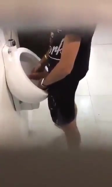 Handjob on urinal