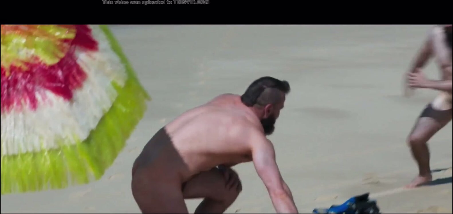 Hot gay scene on beach