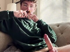 Nerdy guy jerking his dick while using poppers