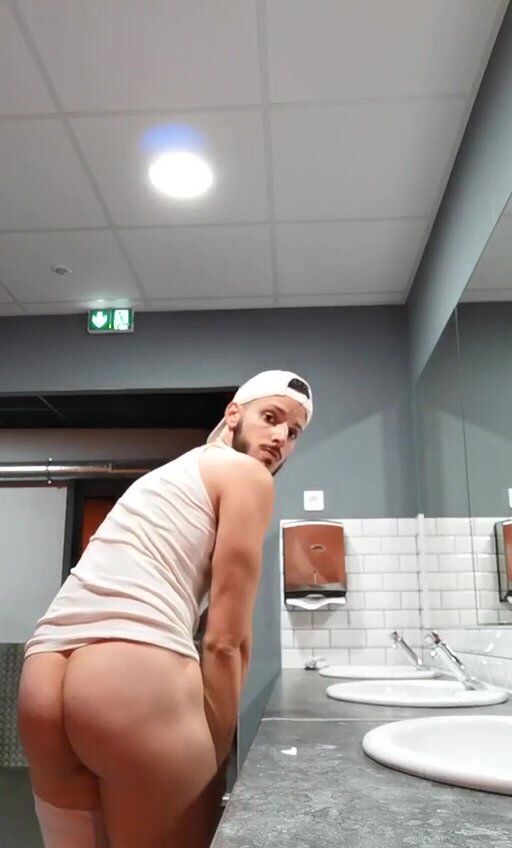 Jerking off in a public restroom big cock