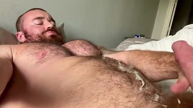 Muscle bear strokes to cum shot