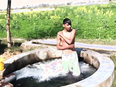 Desi pakistani hot guy showering in nature with bulge