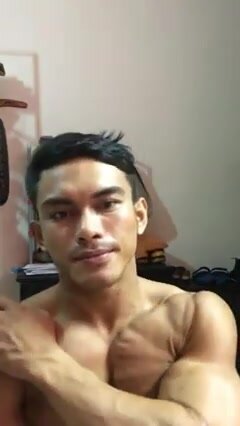 Malaysian sexy bodybuilder Relax and smoke while showin