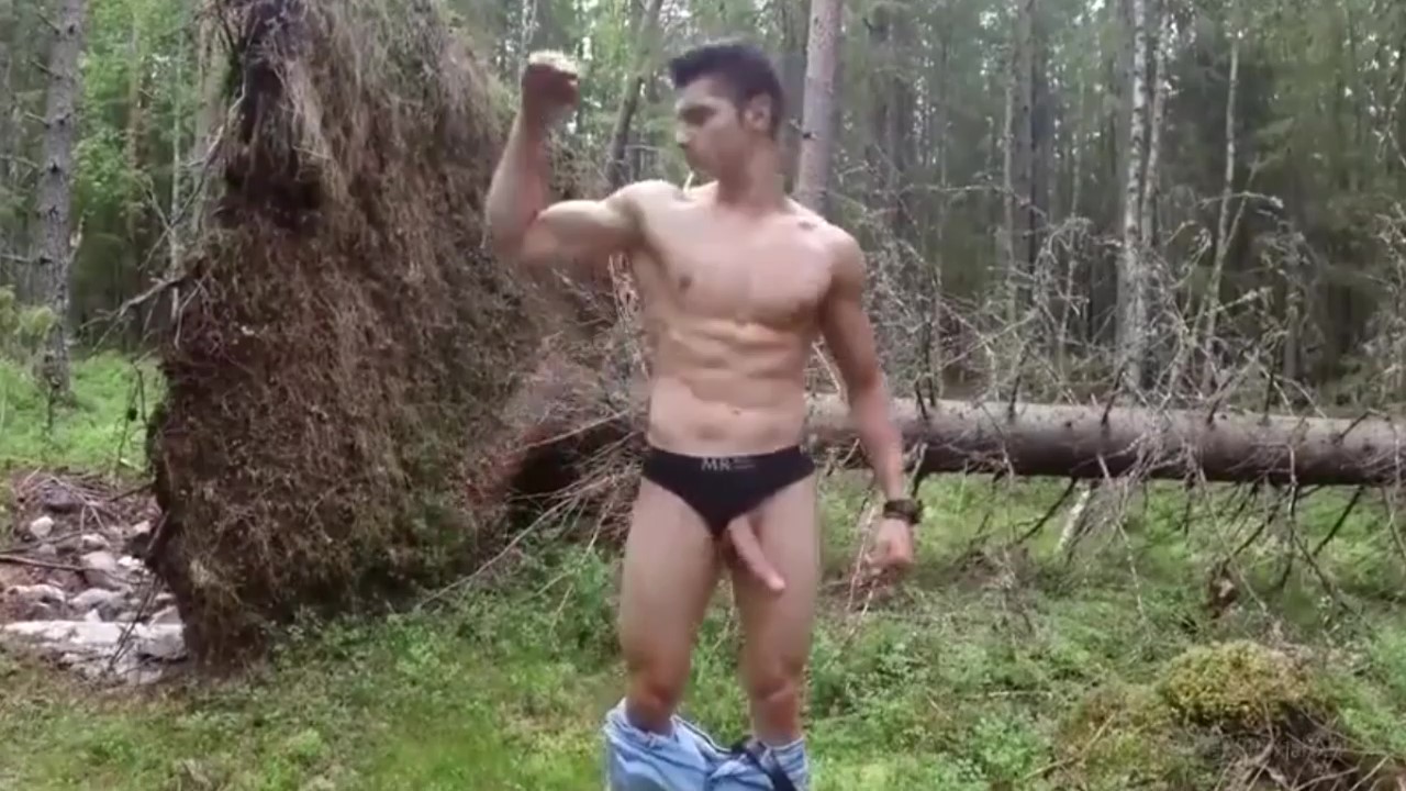 Shaking his mighty goodies in woods