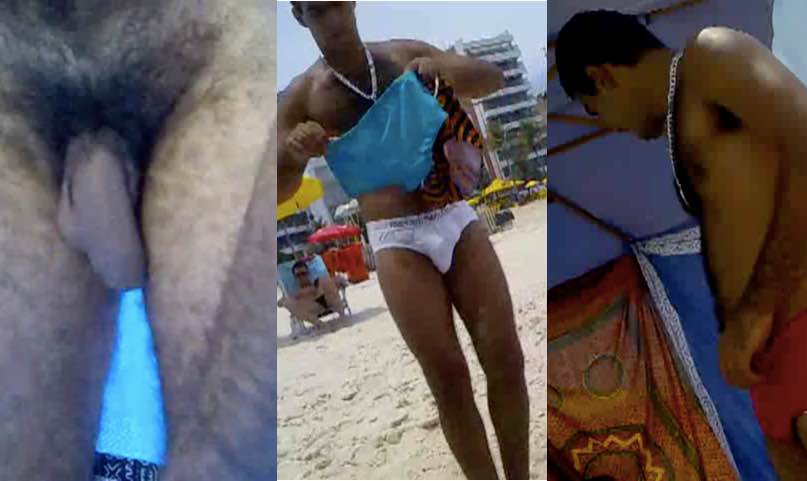 Hot man changing at the beach