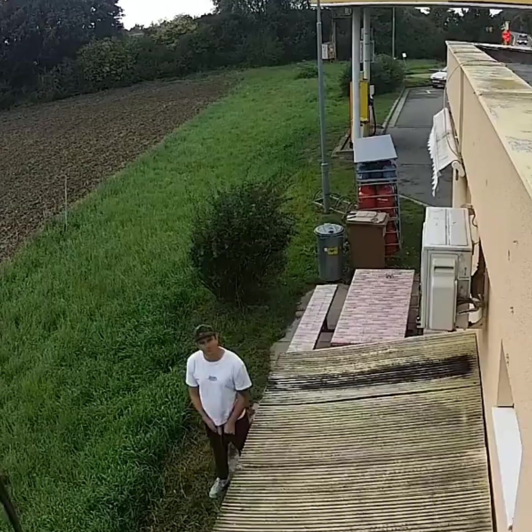 guy caught pissing on security camera