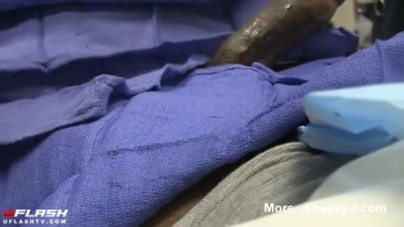 Doctor helps patients erect cock deflate.