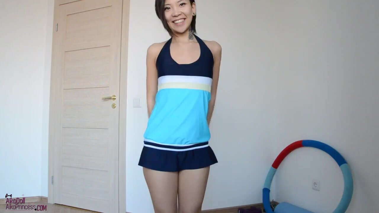 Asian Swimsuit Holding & Peeing