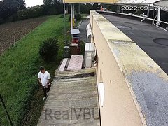 man caught pissing behind gas station