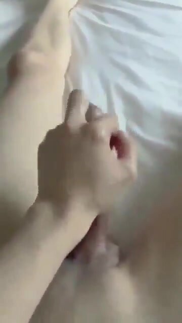 Whimpering Twink Strokes Cock