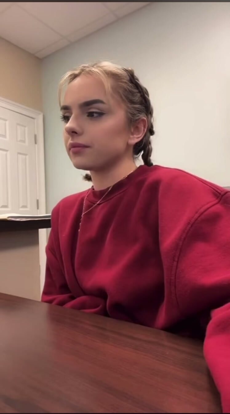 Red Sweater Girl Has Hiccups at Work
