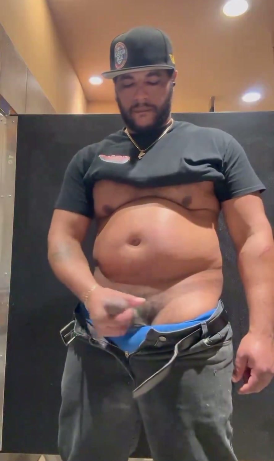 Thick daddy stroking in public toilets