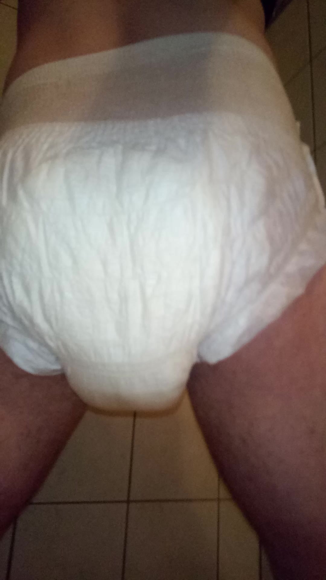 Diaper well filled, squuezed and opened