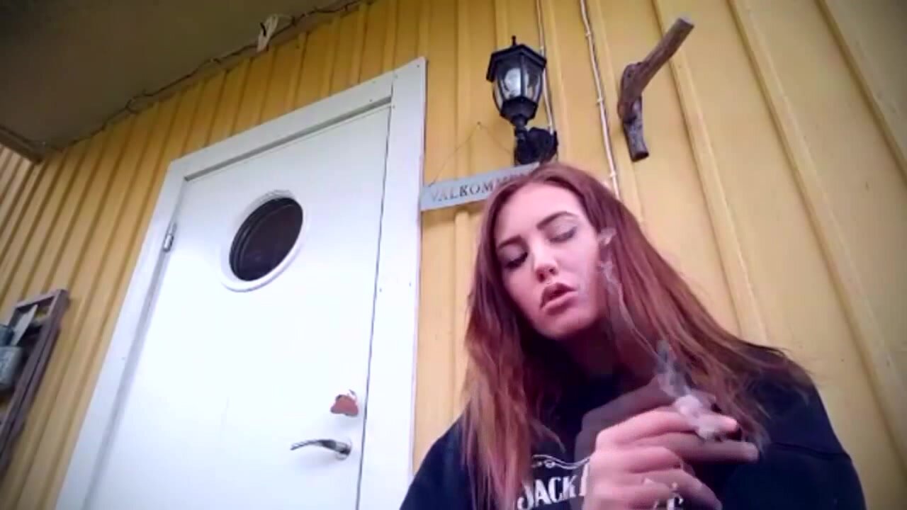 Swedish girl smokes and spits outside