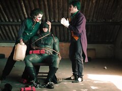 Batman tied up by Joker trio