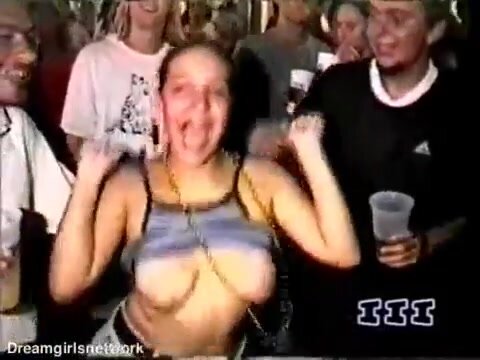 Slutty woman lets men suck her Tits at Mardi Gras