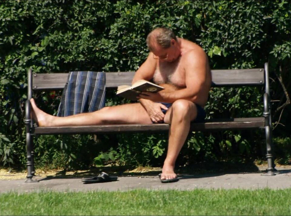 A sexy dad trying to stay  cool at a public park