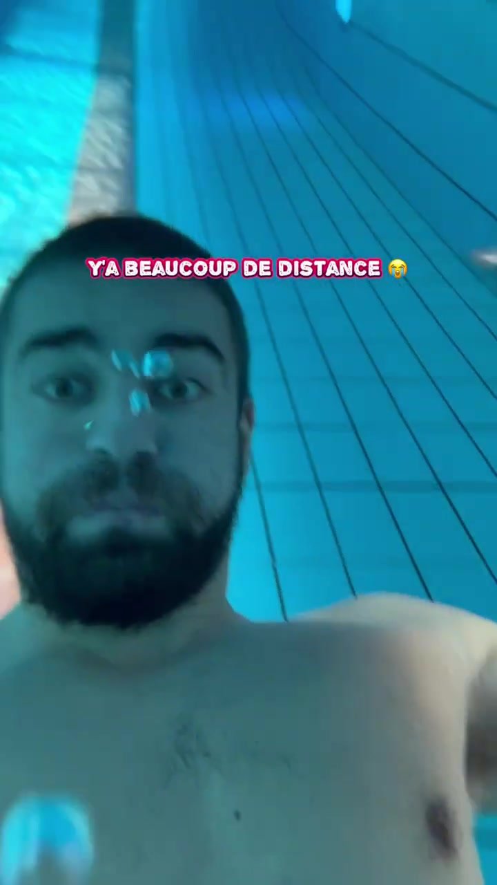 French cutie barefaced underwater in pool