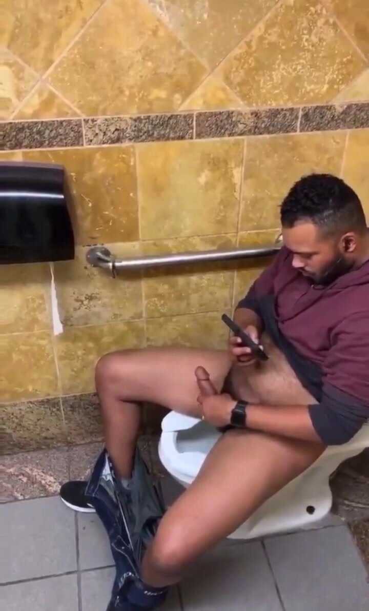 Black men wanking in public toilets