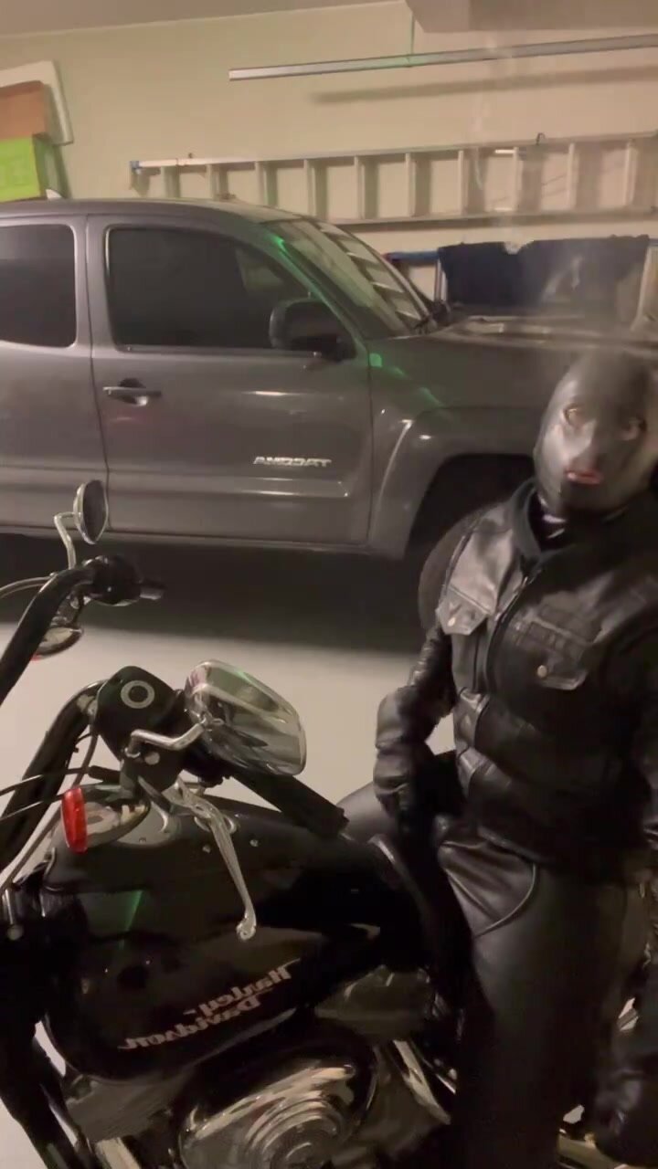 Masked biker smoke