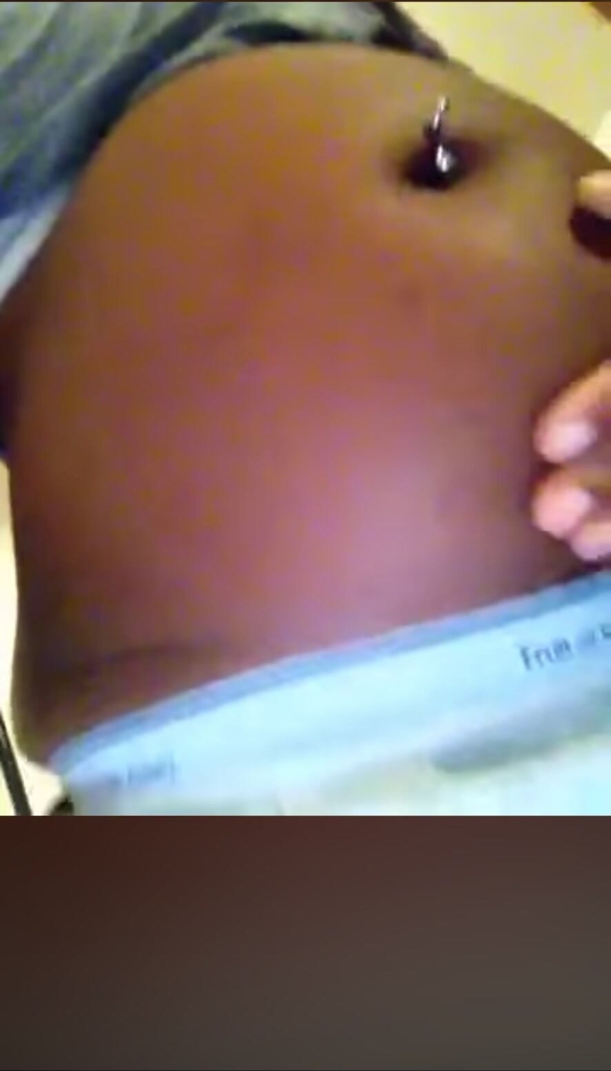 Black Girl showing off her stuffed belly