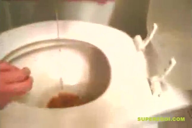 Blonde Lady blows chunks in the toilet.