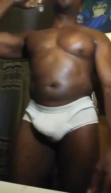 Bodybuilder flexing and grunting part 2