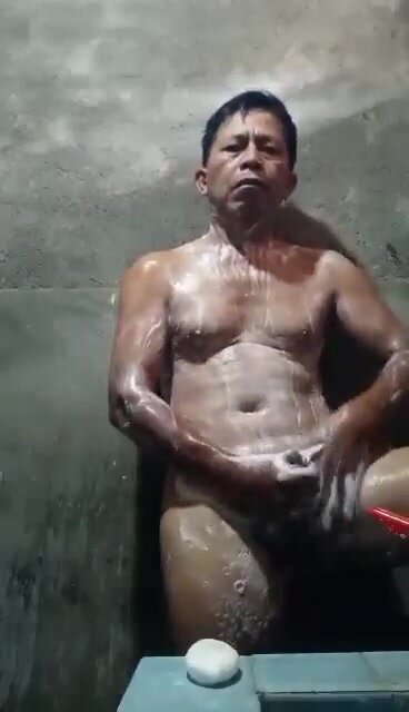 Asian daddy showering and jerking off