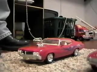 Resin model cars crushed one after the other