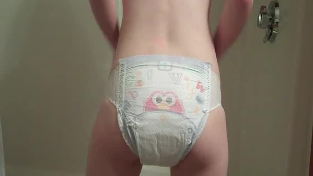 Girl Releases Soft Mush Into Her Elmo Diaper.