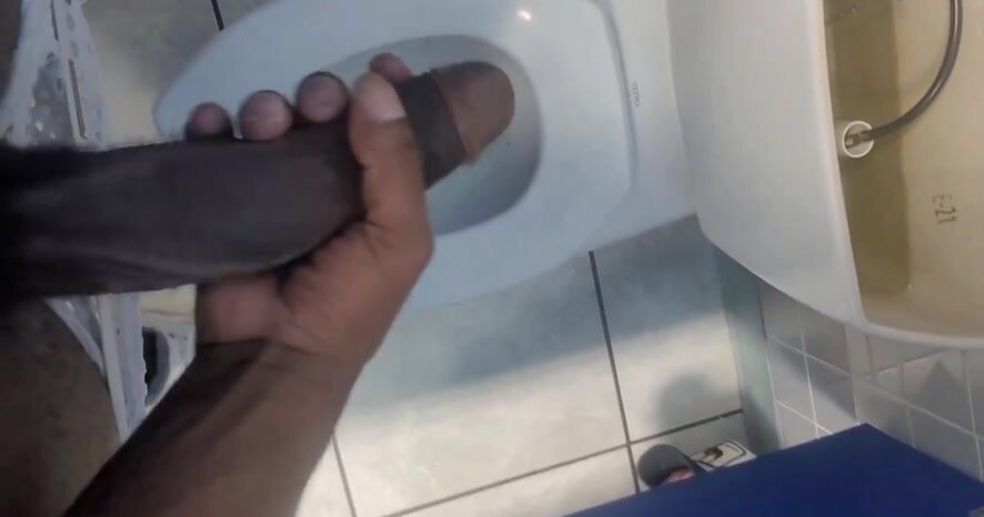 Stroking his huge BBC in public toilets