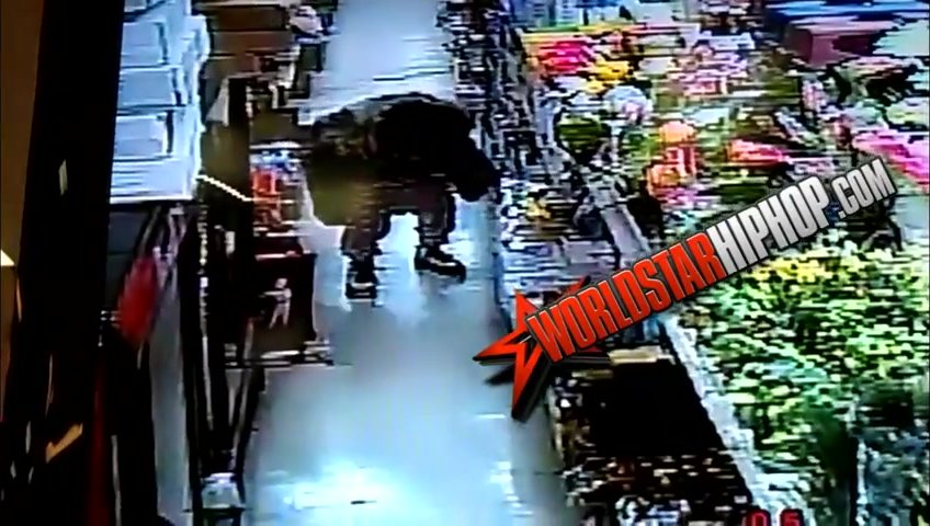 woman pees in a store aisle
