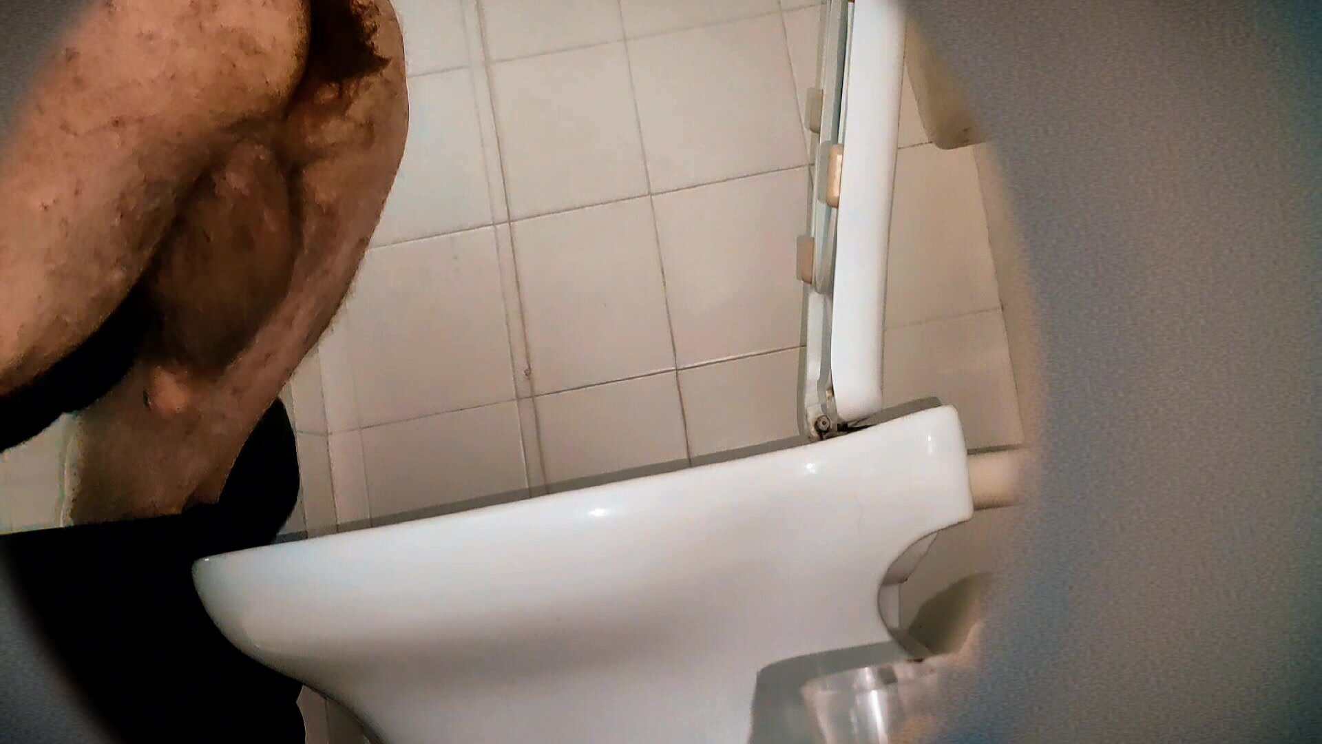 Hairy guy with big balls caught in the bathroom