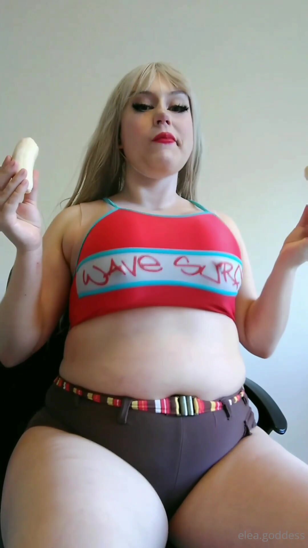 The girl inflates her stomach with soda