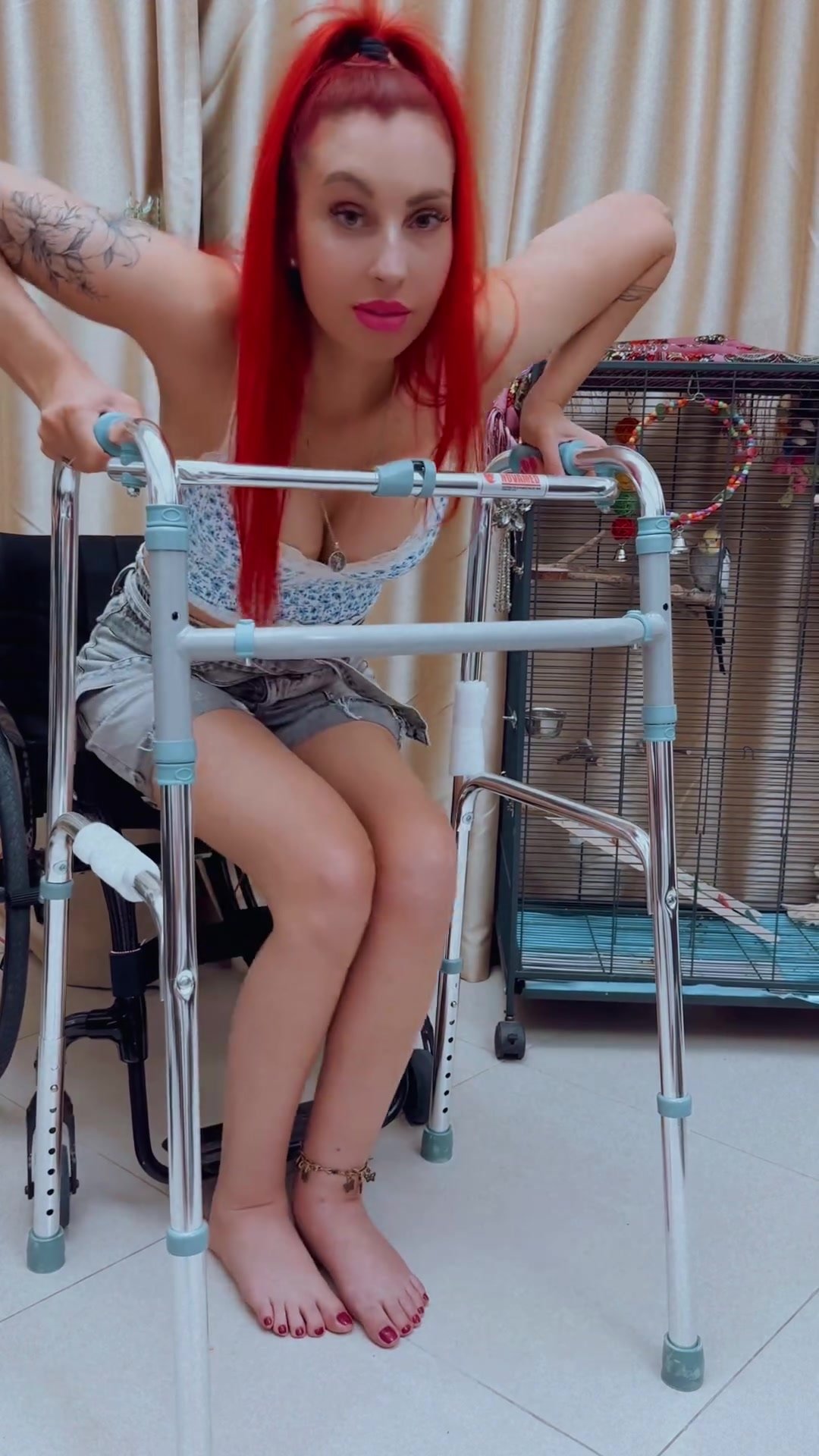 Beautiful redhead paraplegic stands up