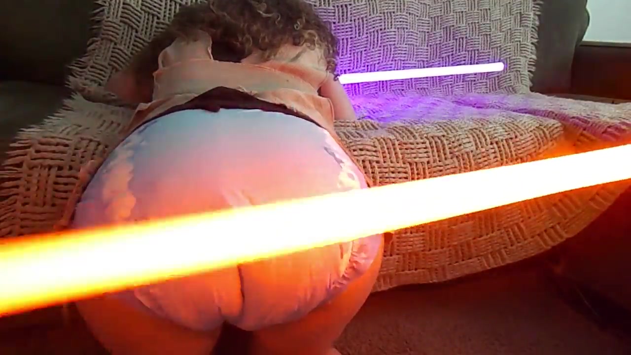 diapered bottom spanked with lightsaber