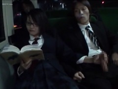 Japanese schoolgirl handjob in the bus