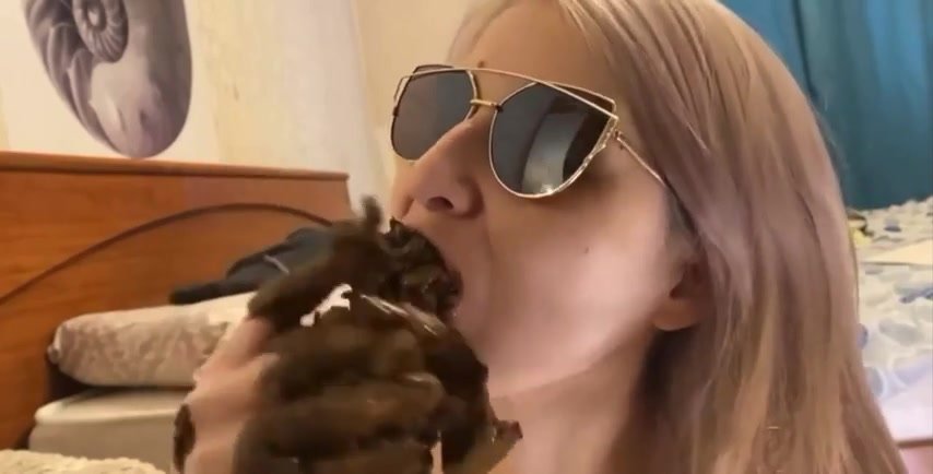 Blonde woman chewing her shit